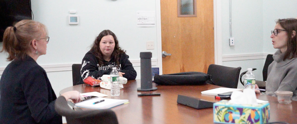 Aimee (center) meets with Journey Program Director Alaina Wolman and Targeted Case Manager Brooke Capreri