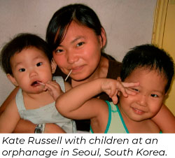 Kate Russell with children at an orphanage in Seoul