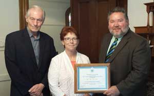 Stephen Mayberry, development director; Diana Rafuse, finance director; and Rick Dorian, executive director proudly pose with The Maine Children's Home's Charity Navigator  4-star certificate.